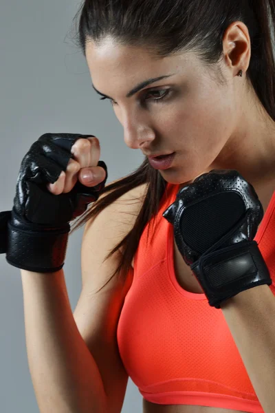 Beautiful fitness woman with the black boxing bandage — Stock Photo, Image