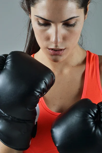 Beautiful fitness woman with the black boxing gloves — Stock Photo, Image