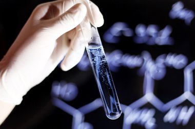 lateks eldiven test tube.formulas arka plan asılı el