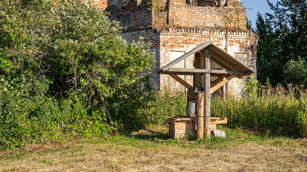 a wooden well in a Russian village