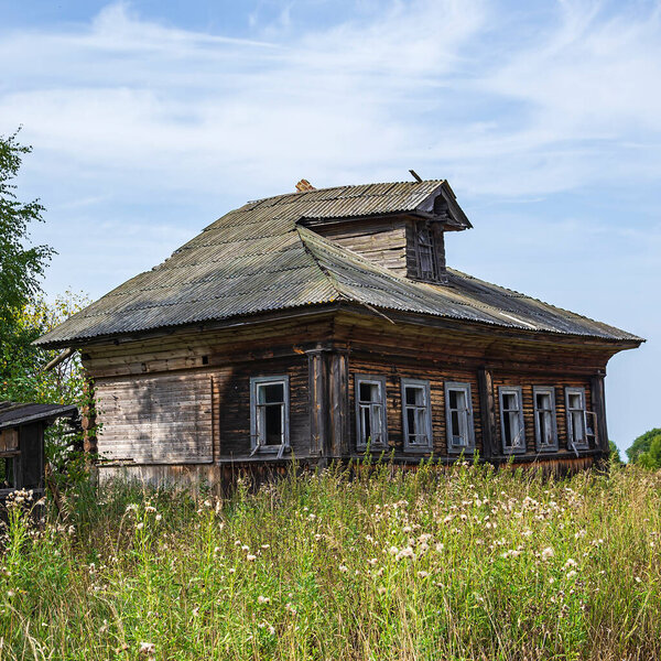 destroyed houses in an abandoned village, Kostroma region, Russia