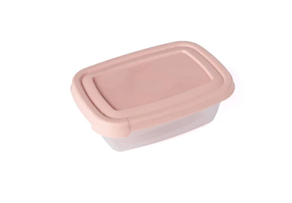 Beyaz arka planda pembe kapaklı plastik gıda depolama kabı. Öğle yemeği için yemek kutusu.. — Stok fotoğraf