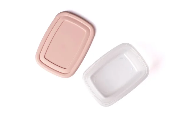 打开带有粉红色盖子的塑料食品容器 隔离在白色背景桌子上 午餐用的饭盒 靠近点顶部视图 — 图库照片