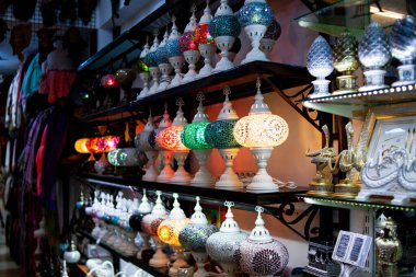 Traditional handmade multicolor Turkish, Moroccan, Arabian lamps. Mosaic style and colored glass lantern. Turkish lamps in souvenir shop in Turkey
