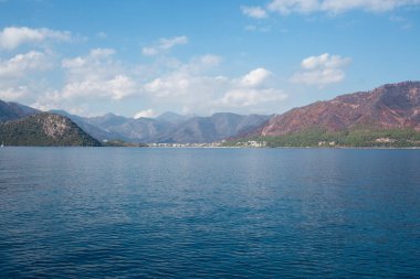 The coast of Turkey near Marmaris city, where the mountains meet the Mediterranean Sea. The shores of Turkey's Mugla province. Mountain hills after big forest fire in 2021.