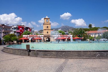 Fountain in the center of Marmaris on a sunny summer day. Marmaris, Turkey - September 8, 2021