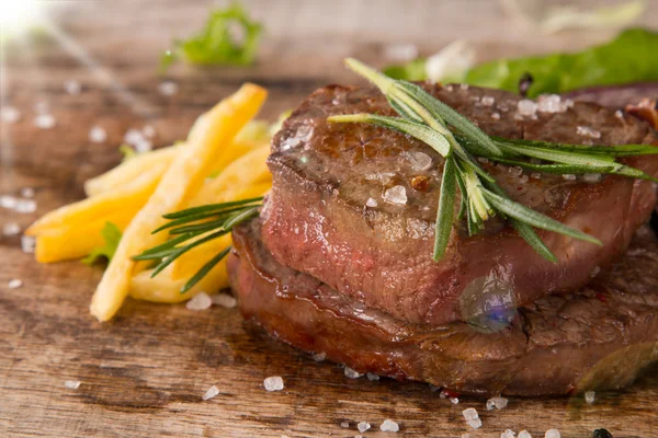 Steak on wood — Stock Photo, Image