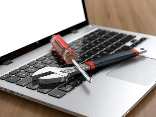 Tools on laptop — Stock Photo, Image
