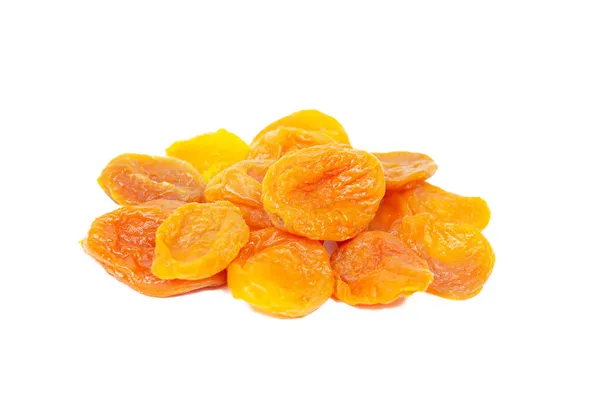 在白色背景上隔绝的橙干杏仁堆 — 图库照片