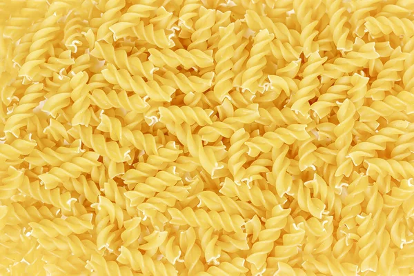 Textura Macarrão Fusilli Amarelo Não Cozido Como Fundo Alimentos — Fotografia de Stock