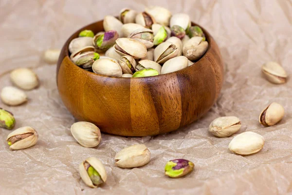 Geröstete Gesalzene Pistazienkerne Nussschale Holzschale Auf Strukturiertem Hintergrund — Stockfoto