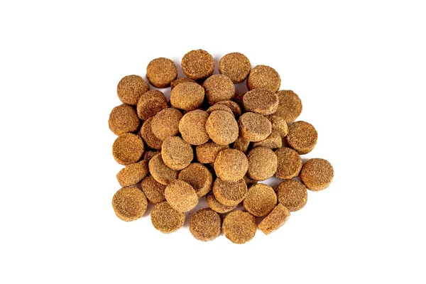 在白色背景上隔离的用于狗饲料堆的褐色脆的有机杂碎块的顶部视图 健康的宠物食品 — 图库照片
