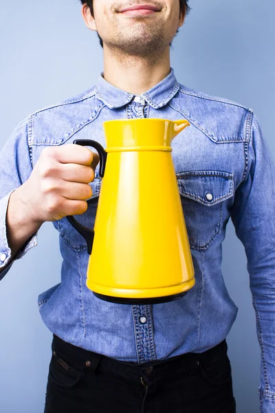 Happy man holding a jug — Stock Photo, Image