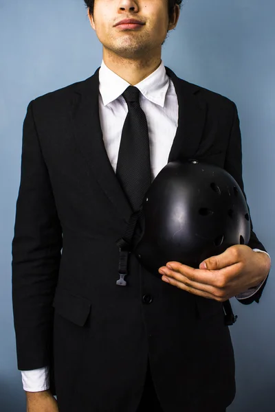 Businessman holding helmet — Stock Photo, Image