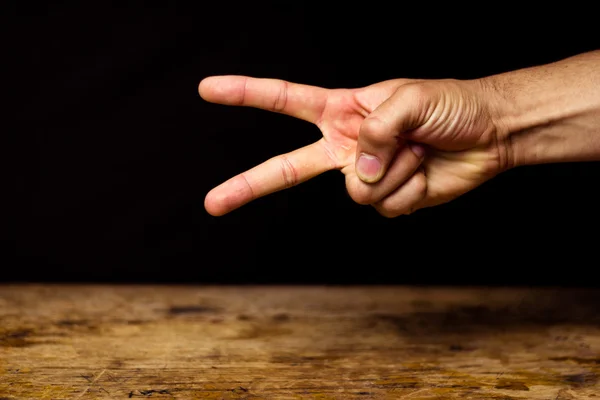 Hand making scissor gesture — Stock Photo, Image