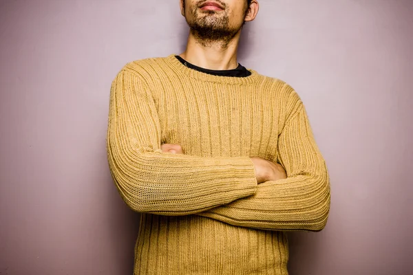 Happy man in yellow jumper — Stock Photo, Image