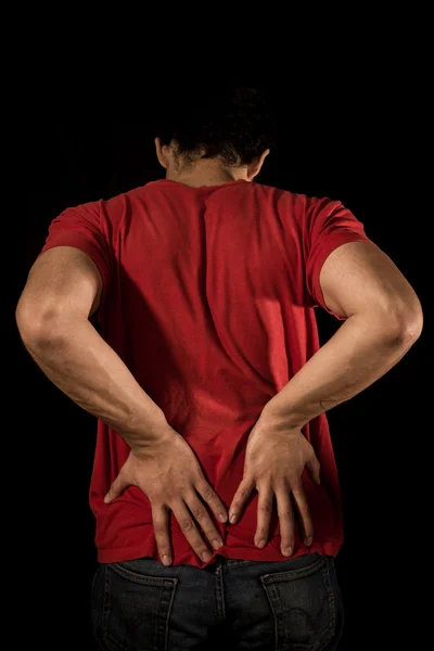 Young man with back pain — Stock Photo, Image