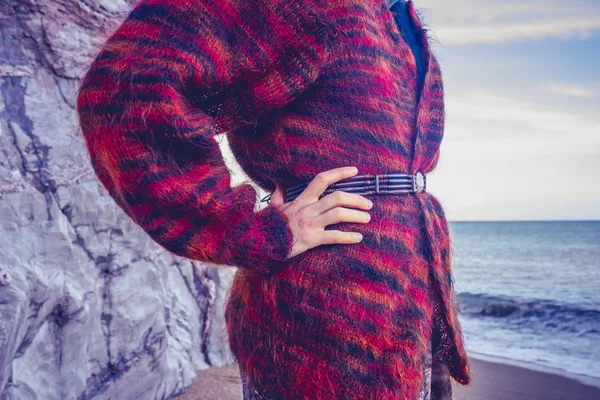 Woman in woolen jumper on the beach — Stock Photo, Image