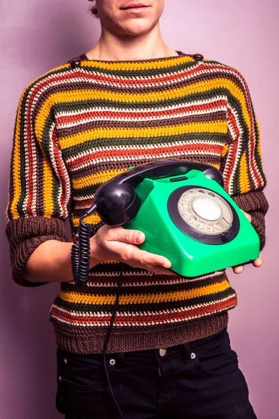 Young woman with old rotary phone — Stock Photo, Image