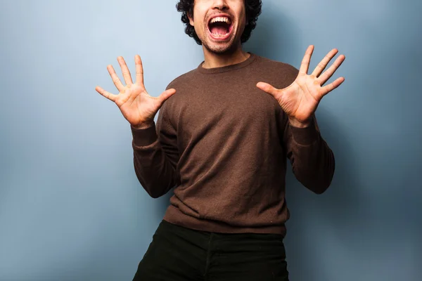 Young man is very excited — Stock Photo, Image