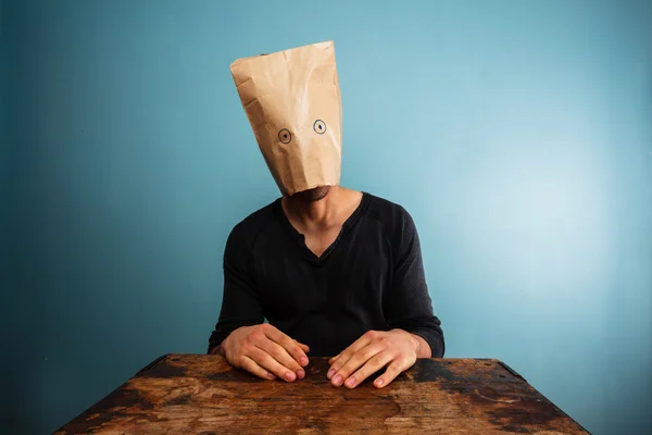 Stupid man with bag over his head — Stock Photo, Image