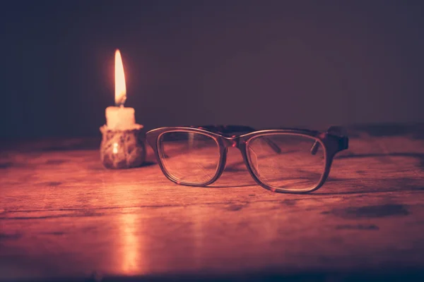 Glasses by candlelight — Stock Photo, Image