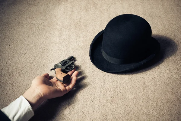 Dead man and hat on floor — Stock Photo, Image