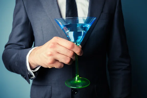 Affärsman med cocktailglas — Stockfoto