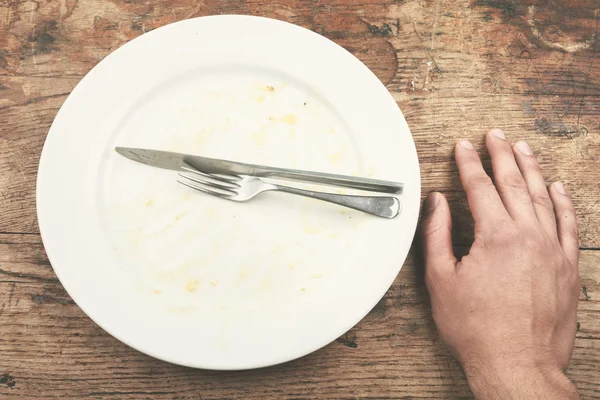 Dirty plate and cutlery — Stock Photo, Image