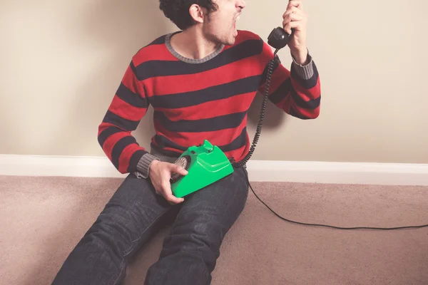 Angry man on the telephone — Stock Photo, Image