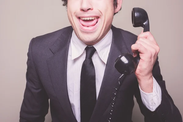 Happy businessman on the phone — Stock Photo, Image