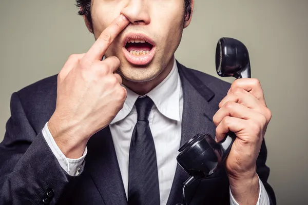 Empresario metiendo la nariz — Foto de Stock