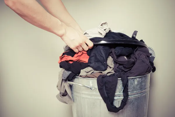 Woman sorting out her laundry — Stock Photo, Image