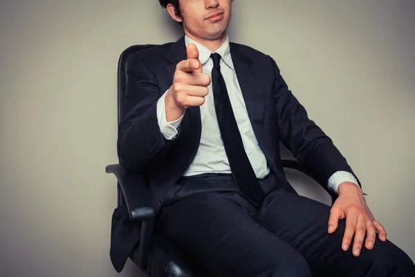 Businessman sitting in office chair — Stock Photo, Image