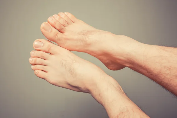 Young man's feet — Stock Photo, Image