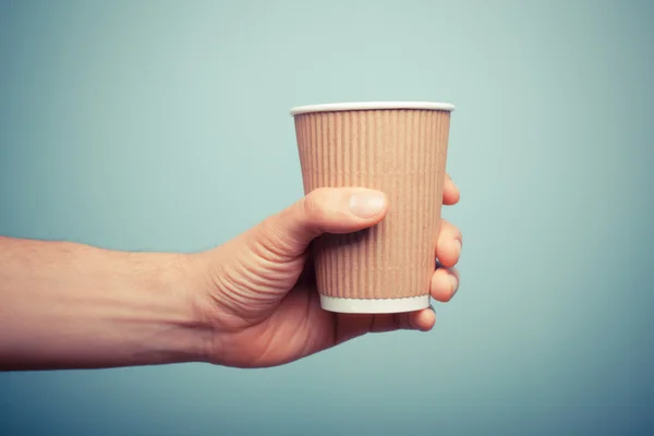 Man holding paper cup Stock Photo by ©lofilolo 46838823