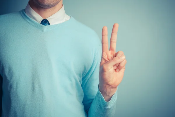 Man giving peace sign — Stock Photo, Image