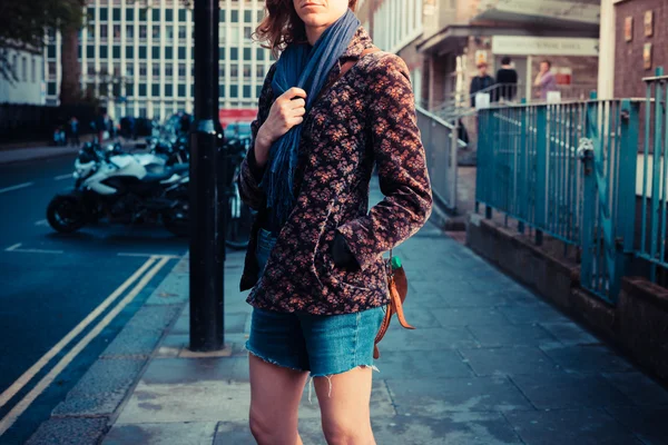 Young woman with scarf in the street — Stock Photo, Image