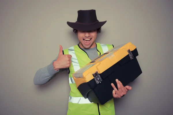 Cowboy builder with tool box — Stock Photo, Image