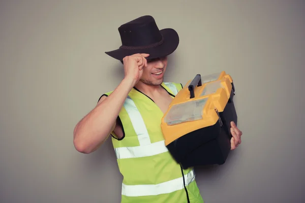 Cowboy builder with tool box — Stock Photo, Image