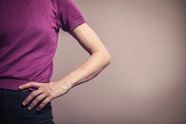 Woman with hand on her hip — Stock Photo, Image