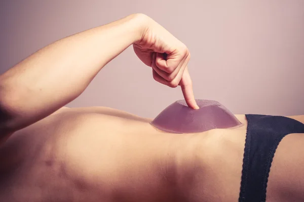 Young woman with jelly on her belly — Stock Photo, Image