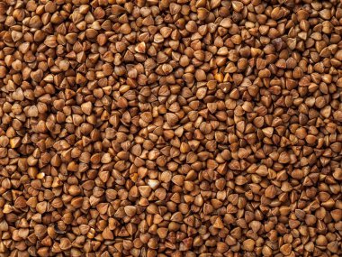 Karabuğday, çiğ, pişmemiş, katı arka plan, diyet için yiyecek, yakın çekim.