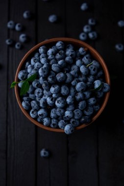 Fresh blueberry background, blueberries with space for text. Vegetarian concept. Berry textures. healthy eating