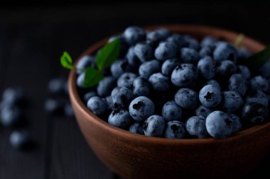 Fresh blueberry background, blueberries with space for text. Vegetarian concept. Berry textures. healthy eating