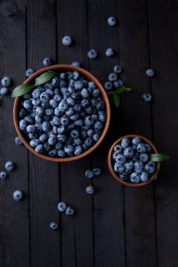 Fresh blueberry background, blueberries with space for text. Vegetarian concept. Berry textures. healthy eating
