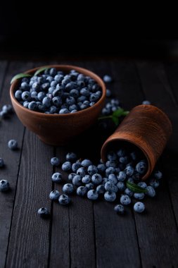 Fresh blueberry background, blueberries with space for text. Vegetarian concept. Berry textures. healthy eating