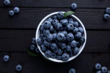 Fresh blueberry background, blueberries with space for text. Vegetarian concept. Berry textures. healthy eating