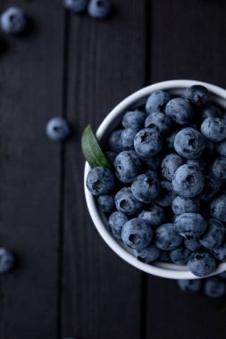 Fresh blueberry background, blueberries with space for text. Vegetarian concept. Berry textures. healthy eating