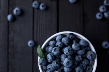 Fresh blueberry background, blueberries with space for text. Vegetarian concept. Berry textures. healthy eating